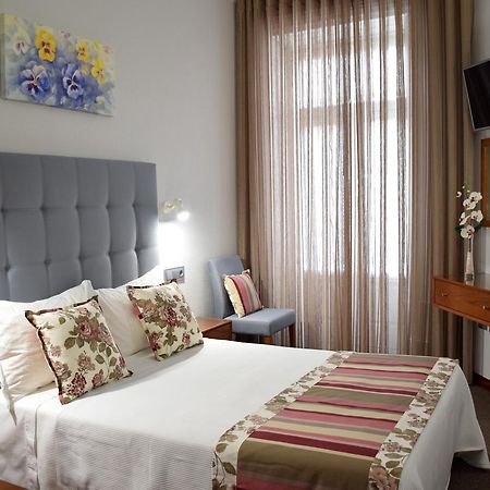 Lusitana Hotel Porto Bagian luar foto