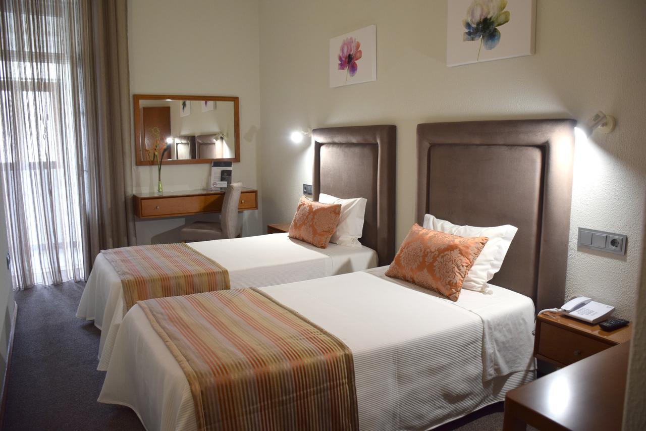 Lusitana Hotel Porto Bagian luar foto
