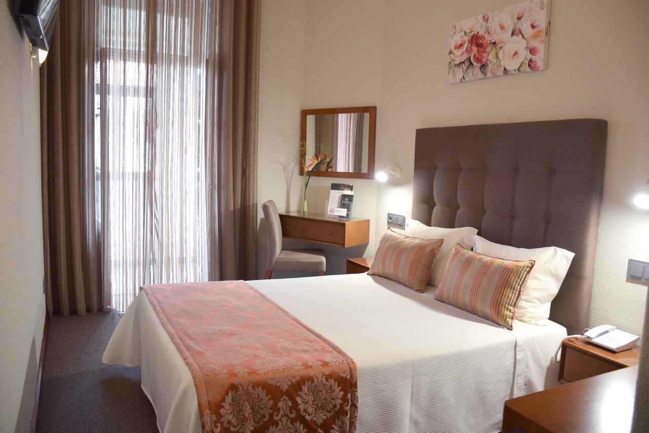 Lusitana Hotel Porto Bagian luar foto
