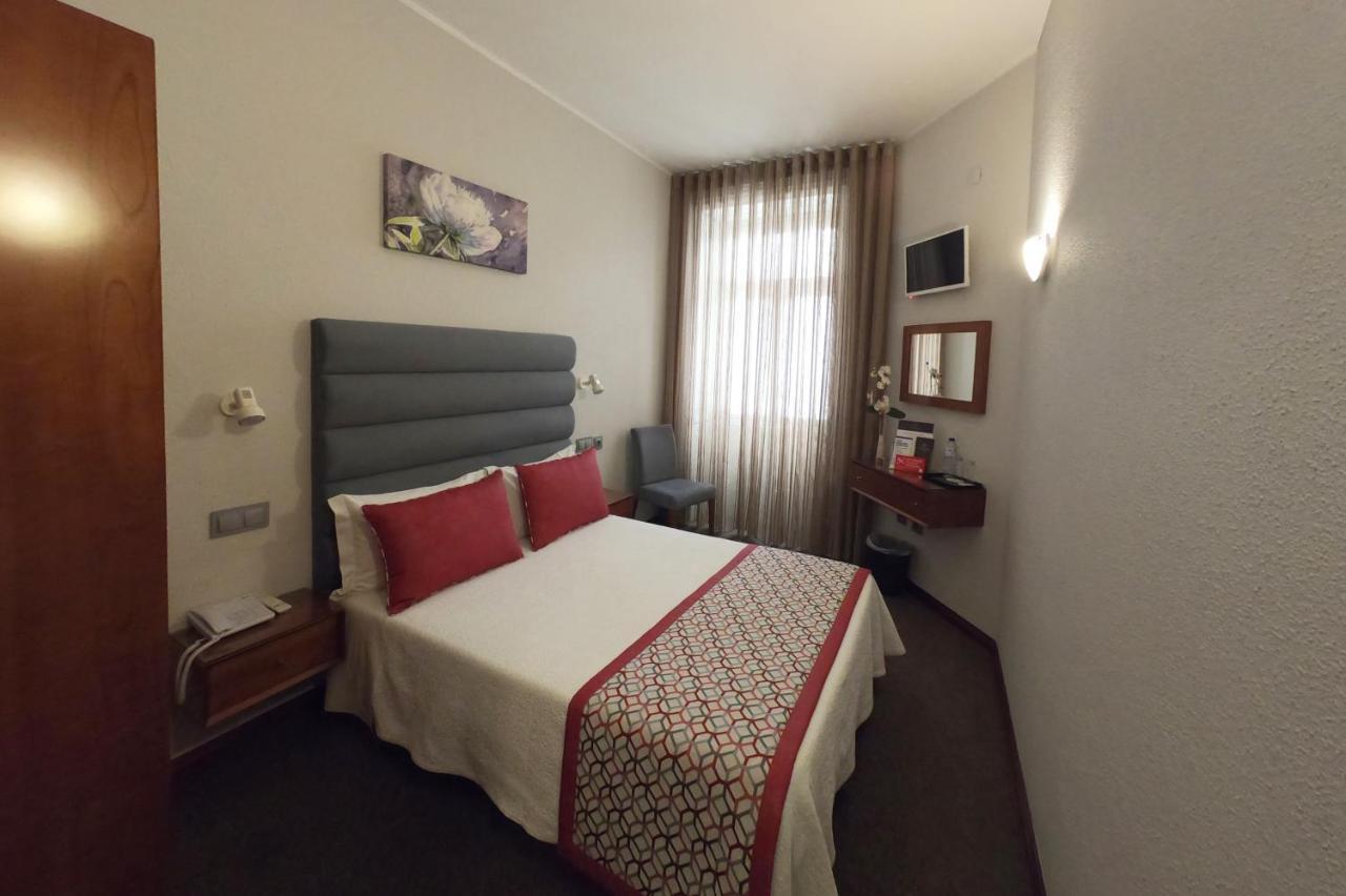 Lusitana Hotel Porto Bagian luar foto