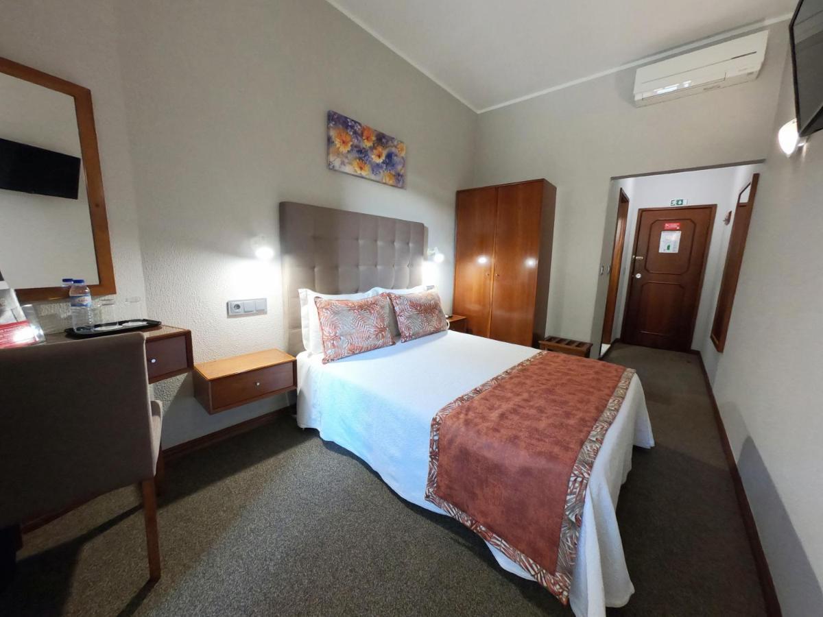 Lusitana Hotel Porto Bagian luar foto